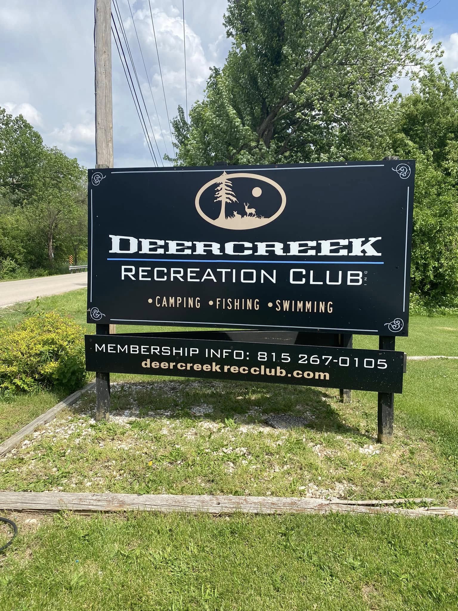Deer Creek Recreation Club entrance sign showing camping fishing and swimming at 22823 E 143rd St Plainfield IL