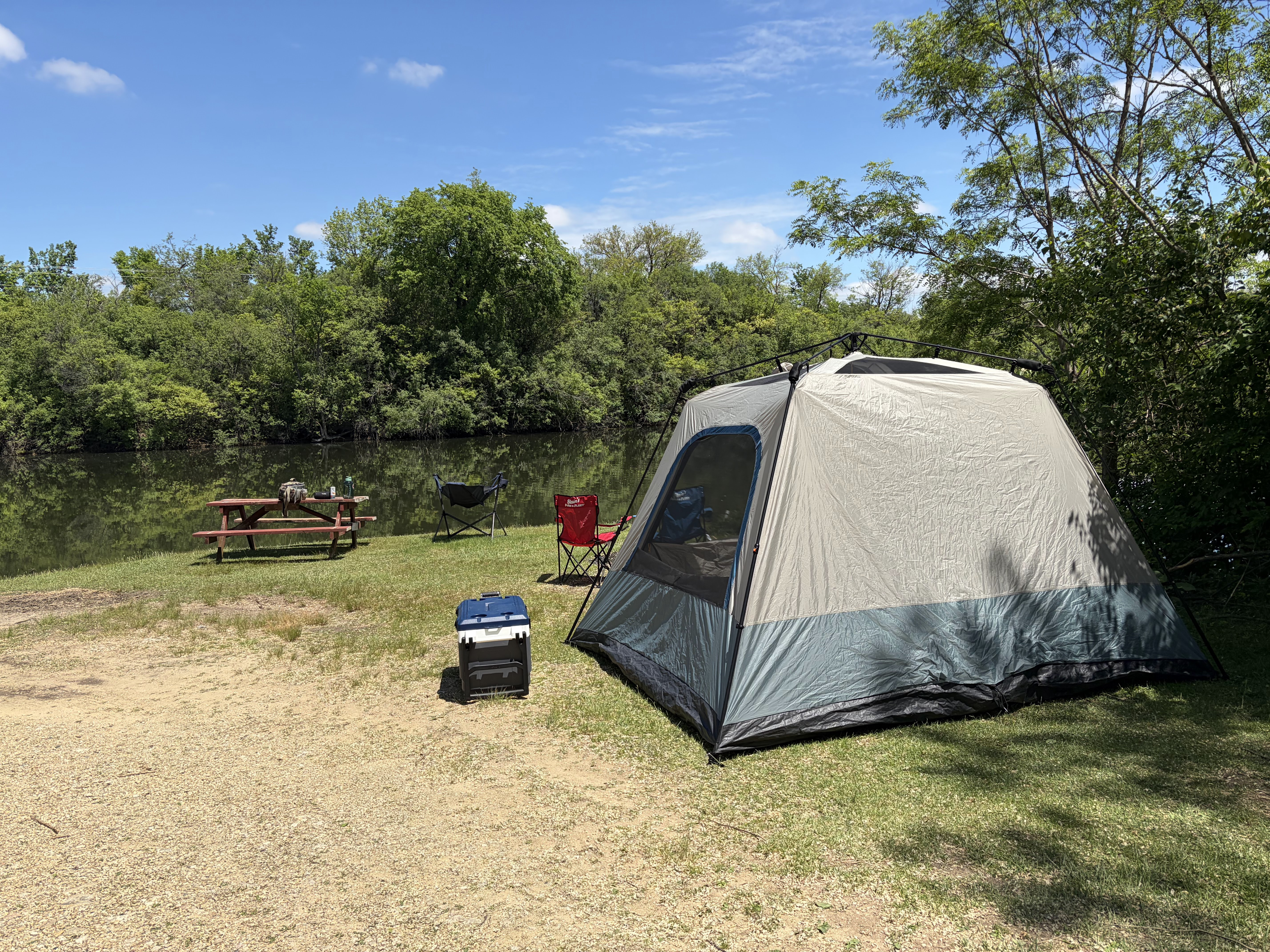 Tent campsite on the lakeside at Deer Creek Recreation Club in Plainfield Illinois