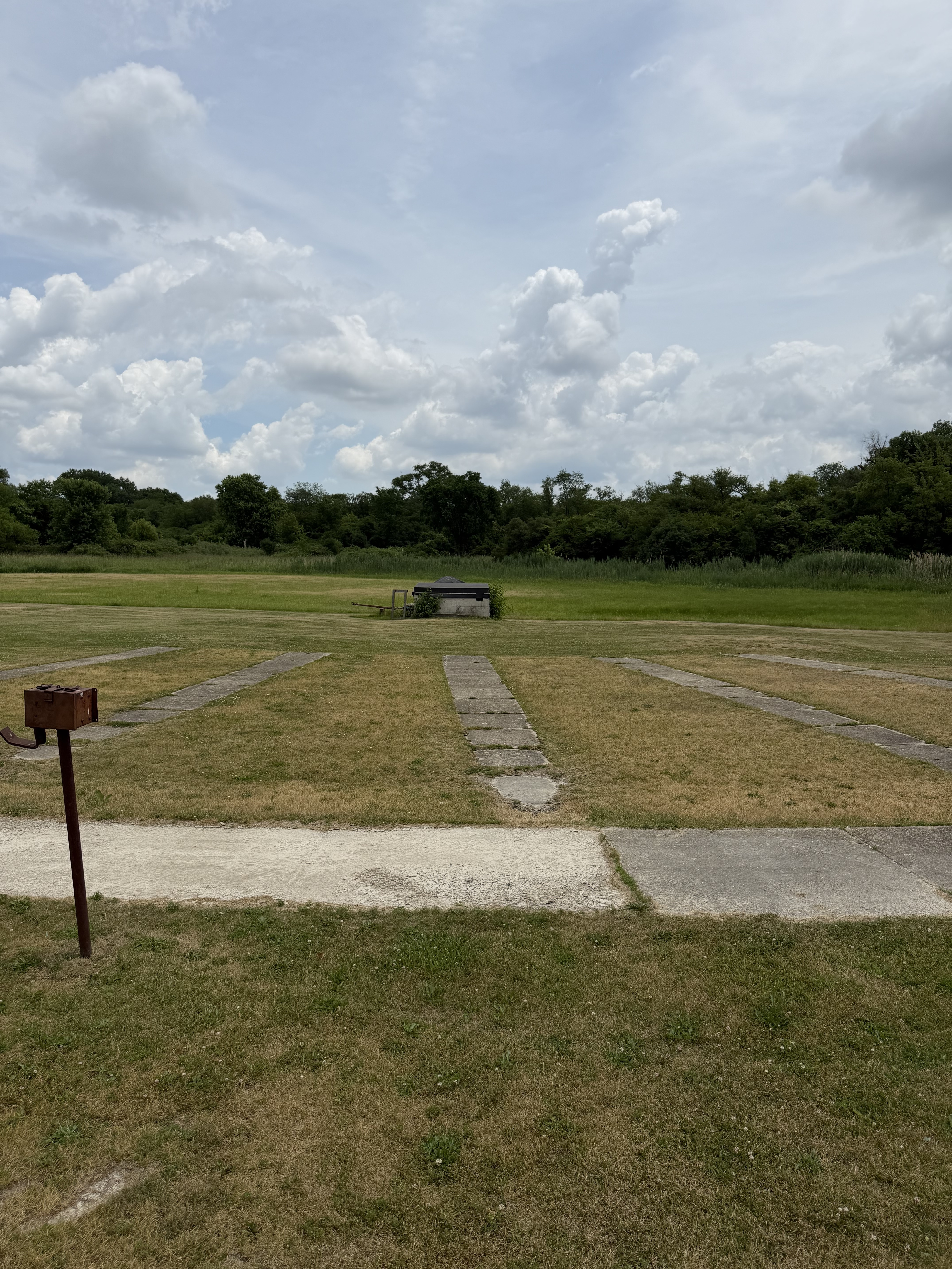 Deer Creek Recreation Club trap field showing concrete shooting positions and clay target trap machine in Plainfield Illinois